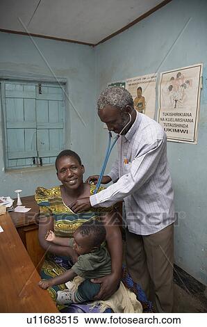 Stock Photography -  people hand person doctor tanzania examining sub. Fotosearch