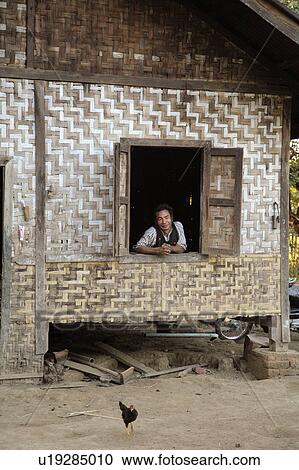 Stock Image -  people house border man person myanmar window . Fotosearch