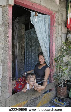 Stock Photograph -  people house child person mother window slum . Fotosearch
