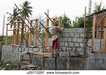 people house person indonesia new kampong low  View Large Photo Image Stock Image -  people house person indonesia new kampong low . Fotosearch