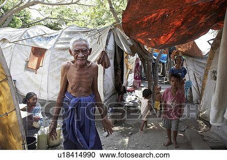 Stock Image -  people man children timor leste camp for idps. Fotosearch