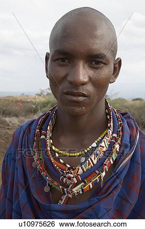 Stock Photograph -  people man person face kenya young masai village. Fotosearch
