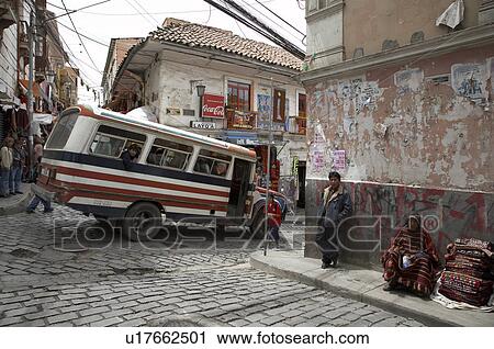 Stock Image -  people person bolivia bus going down street la . Fotosearch