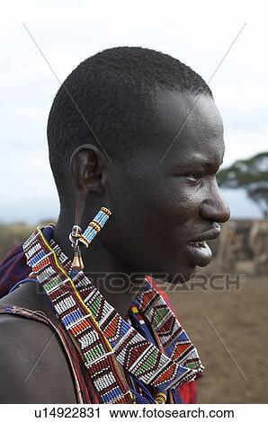 Stock Image -  people person face kenya young masai warrior. Fotosearch