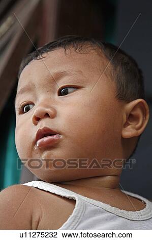 Stock Image -  people person indonesia tsunami survivor aceh . Fotosearch