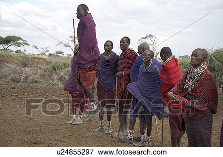 Stock Photo -  people person kenya masai men dancing jumping. Fotosearch