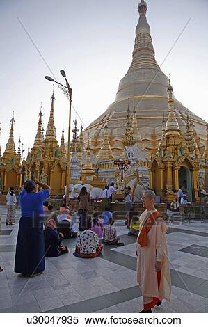 Stock Photography -  people person myanmar shwedagon paya pagoda view. Fotosearch