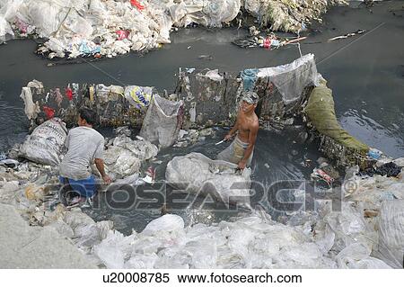 Stock Photography -  people person scavengers work garbage tip bagong . Fotosearch