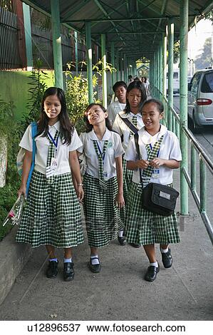 Stock Photo -  people person school girls walking high quezon . Fotosearch
