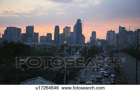 people person sunset over quezon city manila View Large Photo Image Stock Photograph - people person sunset over quezon city manila . Fotosearch
