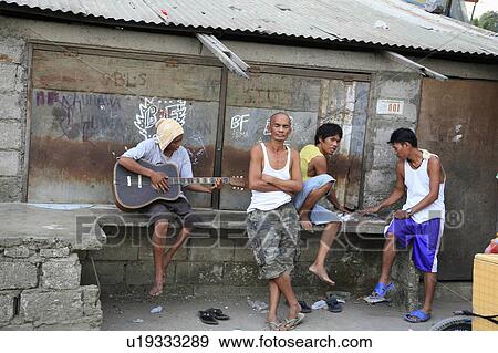 Stock Photo -  people person unemployed men shantytown dwelling . Fotosearch
