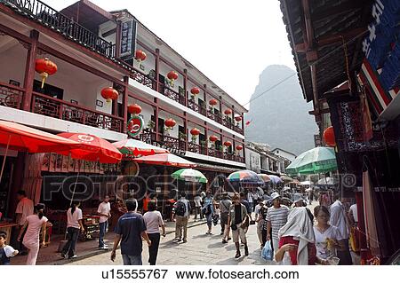people west street in yangshuo guanxi china asia View Large Photo Image Stock Photo - people west street in yangshuo guanxi china asia . Fotosearch