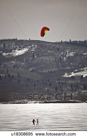 Stock Photography -  people winter children parachute ice skating . Fotosearch