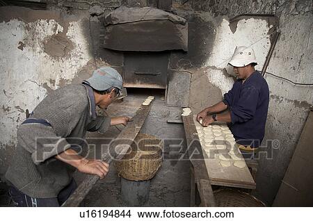 peru making bread wood fired oven colca canyon View Large Photo Image Picture - peru making bread wood fired oven colca canyon. Fotosearch