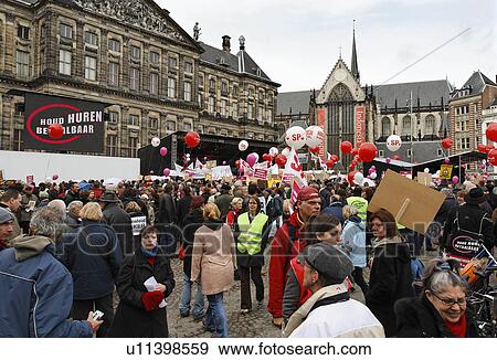 Stock Photo -  protester complain high appartment rents in dam. Fotosearch
