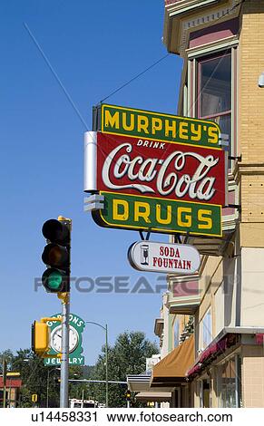 Stock Image -  retro old fashioned 50s style drug store in town. Fotosearch