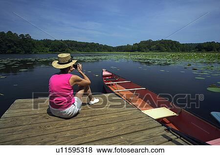Stock Photo -  rusk texas state railroad park lake lotuses. Fotosearch