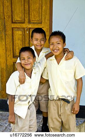 Stock Photograph -  school children students aged 7, 8, 9 in beautiful island dominica caribbean. Fotosearch
