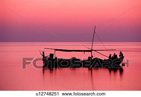 silhouette adult men boat calm calmness View Large Photo Image Stock Image - silhouette adult men boat calm calmness . Fotosearch