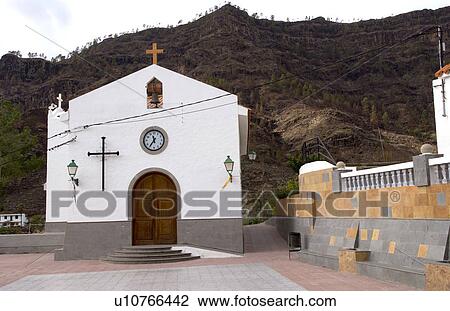 Stock Image -  small white cathedral church in remote town . Fotosearch