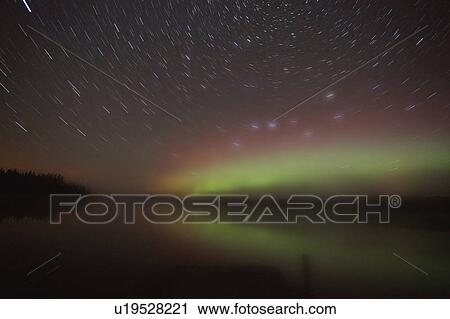 Stock Image -  star northern nights trails in scenic landscape. Fotosearch