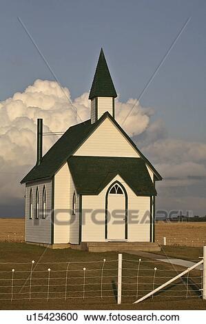 summer clouds forming behind country church View Large Photo Image Stock Image - summer clouds forming behind country church . Fotosearch