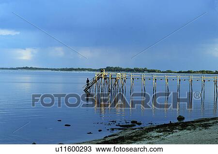 Stock Image -  summer matlock pier lake winnipeg manitoba relax. Fotosearch