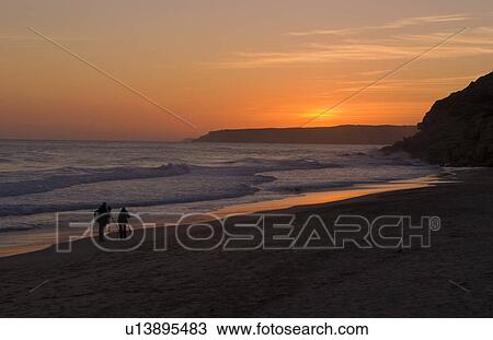 sunset ocean color cliffs in small town salema View Large Photo Image Stock Image - sunset ocean color cliffs in small town salema. Fotosearch