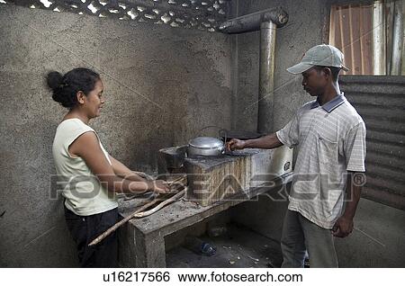 Stock Photograph -  technology timor leste fuel efficient wood cook. Fotosearch