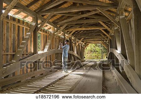 this 97 foot burr truss covered bridge several View Large Photo Image Stock Photograph - this 97 foot burr truss covered bridge several. Fotosearch