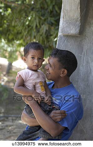 Stock Photography -  timor leste father son aileu east asia south . Fotosearch