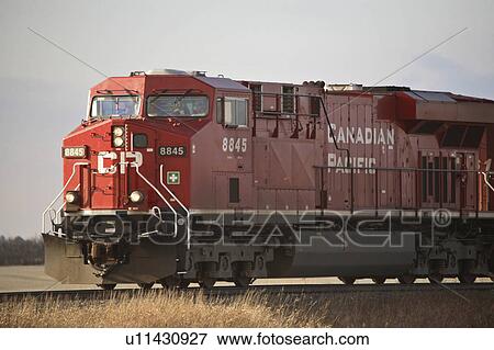 train crossing railway tracks red engine pacific View Large Photo Image Stock Photo - train crossing railway tracks red engine pacific. Fotosearch