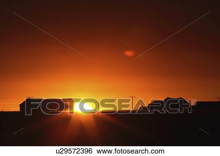 tree house sun art rising behind farm building View Large Photo Image Stock Photograph - tree house sun art rising behind farm building . Fotosearch