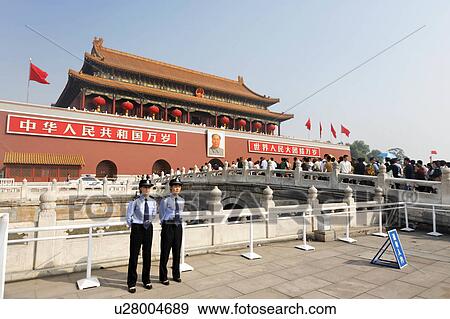 Stock Photo -  two female police officer watch crowds gate . Fotosearch
