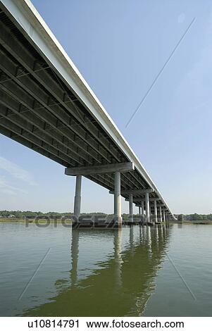 underside bridge spanning waterway in south usa View Large Photo Image Stock Image - underside bridge spanning waterway in south usa. Fotosearch