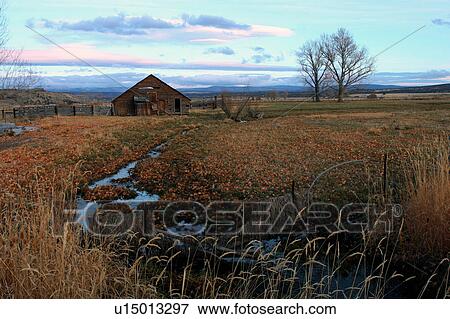 Stock Photo -  water barn in rural northern california autumn. Fotosearch