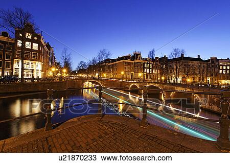 Stock Image -  water canal bridges night amsterdam bridge water . Fotosearch