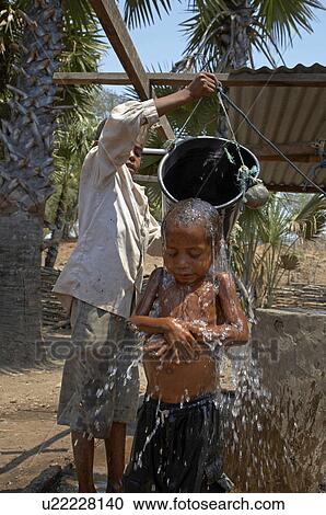 water child children timor leste boy given bath View Large Photo Image Stock Image - water child children timor leste boy given bath. Fotosearch