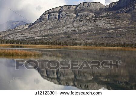 Stock Image -  water mountain in scenic alberta rocky mountains. Fotosearch