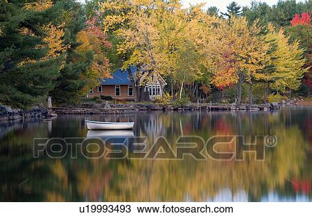 water peaceful quiet scene lake small boat View Large Photo Image Stock Image - water peaceful quiet scene lake small boat . Fotosearch