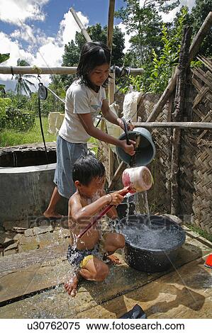 Stock Photography -  water people child person children indonesia . Fotosearch