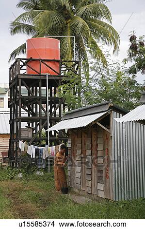 Picture -  water people person indonesia temporary latrines . Fotosearch