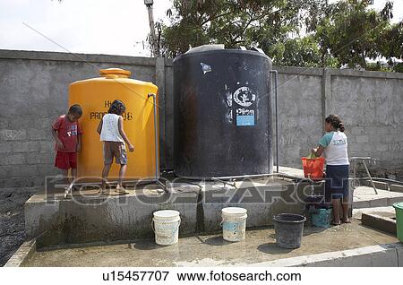 Stock Photo -  water people timor leste camp for internally displaced. Fotosearch