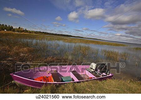 Stock Image -  water pink boat in scenic life jacket tackle box. Fotosearch