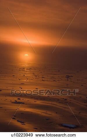 Stock Photo -  water reflection greenland sunrise airy dainty . Fotosearch