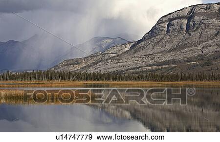 water snow clouds in rocky mountains alberta View Large Photo Image Stock Photo - water snow clouds in rocky mountains alberta. Fotosearch