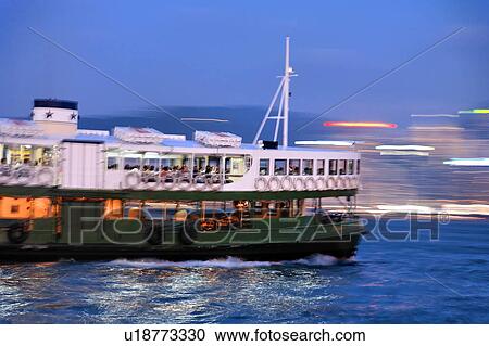 Stock Image -  water star ferry victoria harbour dusk hong kong . Fotosearch