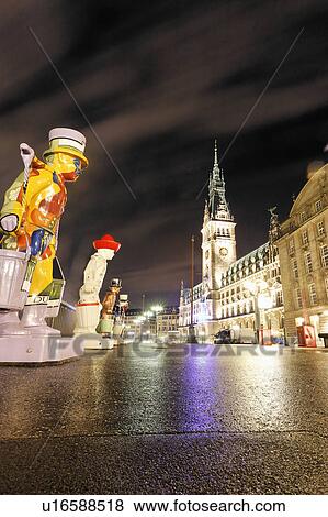 water statues clowns carrying overlook night View Large Photo Image Stock Photo - water statues clowns carrying overlook night . Fotosearch