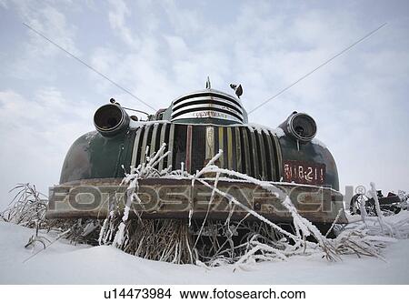 Picture -  winter art abandoned old farm truck in vehicles . Fotosearch