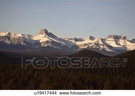 winter rocky mountains in snow covered shadows View Large Photo Image Picture - winter rocky mountains in snow covered shadows. Fotosearch
